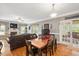 Inviting living and dining area with hardwood floors and abundant natural light at 517 Wheddon Cross Way, Wake Forest, NC 27587