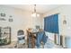 Dining room featuring a table set, chandelier, and unique decor at 54 Lockwood Dr, Clayton, NC 27527