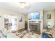 Comfortable living room with fireplace and modern entertainment setup at 54 Lockwood Dr, Clayton, NC 27527
