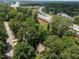 Aerial view of a house near a highway, showcasing the neighborhood's convenient location and nearby amenities at 5520 Kaplan Dr, Raleigh, NC 27606