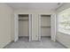 Bedroom featuring closets and windows at 5520 Kaplan Dr, Raleigh, NC 27606