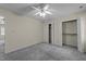 Bedroom showcasing a ceiling fan and closet space at 5520 Kaplan Dr, Raleigh, NC 27606