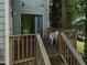 Deck features a chair and overlooks trees at 5520 Kaplan Dr, Raleigh, NC 27606
