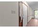 Hallway has a closet and leads to a space with natural light at 5520 Kaplan Dr, Raleigh, NC 27606