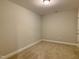 Bare basement with neutral walls and carpeting at 656 Barneswyck Dr, Fuquay Varina, NC 27526