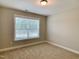 Bedroom bathed in natural light from a large window, creating a welcoming space at 656 Barneswyck Dr, Fuquay Varina, NC 27526