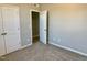 Bedroom featuring neutral walls, carpeting, and closet space at 656 Barneswyck Dr, Fuquay Varina, NC 27526