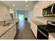 Open-concept kitchen featuring granite countertops, stainless steel appliances, and stylish finishes at 656 Barneswyck Dr, Fuquay Varina, NC 27526