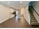 Open floor plan with modern kitchen and stairs at 656 Barneswyck Dr, Fuquay Varina, NC 27526