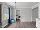 Bright kitchenette with stainless steel refrigerator and lots of natural light at 729 Carolina Dr, Dunn, NC 28334