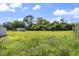 Large lot with mature trees offers plenty of space to build or enjoy the outdoors at 729 Carolina Dr, Dunn, NC 28334