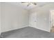 Bedroom with neutral paint, plush carpet and open door at 80 Birchtop Cir, Zebulon, NC 27597