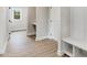Hallway featuring a drop zone with bench, providing a convenient transition space at 80 Birchtop Cir, Zebulon, NC 27597