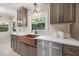 Beautiful kitchen features modern fixtures, custom cabinets, and stainless steel appliances at 800 Camden Ave, Durham, NC 27701