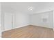 A bedroom featuring hardwood floors, a window, and neutral decor at 857 Whistable Ave, Wake Forest, NC 27587