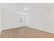 Hardwood flooring in a bedroom with neutral walls and natural light at 857 Whistable Ave, Wake Forest, NC 27587