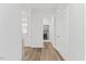 Hallway featuring modern door frames and hardwood flooring at 857 Whistable Ave, Wake Forest, NC 27587