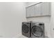Well-equipped laundry room with modern washer and dryer units at 857 Whistable Ave, Wake Forest, NC 27587
