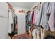 Walk-in closet with ample storage space, including shelving and hanging rods at 100 Donald Dr, Pittsboro, NC 27312