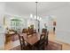 Spacious dining area open to a living room; a bright airy space at 100 Donald Dr, Pittsboro, NC 27312