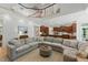 Spacious living area with fireplace, and cozy sectional sofa at 100 Donald Dr, Pittsboro, NC 27312