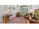 Bright living room with neutral walls, shutters, and stylish decor at 100 Donald Dr, Pittsboro, NC 27312