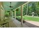 Inviting porch with swing and seating area provides a relaxing outdoor space at 100 Donald Dr, Pittsboro, NC 27312