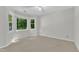 Bedroom with large windows providing lots of natural light at 100 Windvale Ct, Cary, NC 27518
