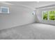 Large bedroom offers great natural light and a neutral color palette at 1061 Hardin Hill Ln, Knightdale, NC 27545