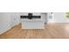 Open concept kitchen with large island, stainless steel appliances, and hardwood floors, perfect for entertaining at 1061 Hardin Hill Ln, Knightdale, NC 27545