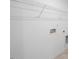 Large laundry room features white walls, overhead rack for hanging clothing and hookups at 1061 Hardin Hill Ln, Knightdale, NC 27545