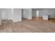 Open concept living area features hardwood floors, new paint, and lots of natural light at 1061 Hardin Hill Ln, Knightdale, NC 27545