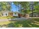 Spacious backyard with detached garage and mature trees at 1139 Princeton Kenly Rd, Kenly, NC 27542