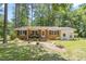 Well maintained, brick and siding house with mature trees at 1139 Princeton Kenly Rd, Kenly, NC 27542