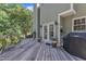 A spacious deck extends from the house, offering outdoor living and backyard views at 115 E Seve Ct, Morrisville, NC 27560