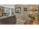 Stylish living room with a decorative lamp, artwork, and a glimpse of the cozy atmosphere at 115 E Seve Ct, Morrisville, NC 27560