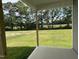 A beautiful covered back porch area perfect for outdoor relaxing at 140 Oakfield Trace Dr, Four Oaks, NC 27524
