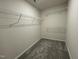 A walk-in closet featuring ample shelving for optimal organization at 140 Oakfield Trace Dr, Four Oaks, NC 27524