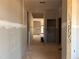 Hallway featuring freshly installed drywall, creating a smooth canvas for new paint and design at 1413 Malcus Ct # 61, Fuquay Varina, NC 27526