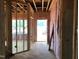 Partially insulated interior framing, showing the layout with doorway to the front at 1413 Malcus Ct # 61, Fuquay Varina, NC 27526