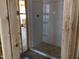 New shower installed in bathroom, surrounded by exposed wood framing and utilities at 1413 Malcus Ct # 61, Fuquay Varina, NC 27526