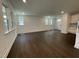 Beautifully bright open living and dining space features hardwood floors and recessed lighting fixtures at 1577 Goldfinch Perch Ln, Knightdale, NC 27545