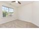 Bright bedroom featuring a neutral carpet, and a window for lots of natural light at 1613 Patterson Grove Rd, Apex, NC 27502