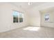 Spacious bedroom featuring neutral carpet, and two windows for lots of natural light at 1613 Patterson Grove Rd, Apex, NC 27502