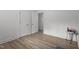 Bright bedroom with hardwood floors, closet space, and minimalist decor at 1832 Blandwood Dr, Rocky Mount, NC 27801