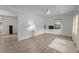 Spacious living room with hardwood floors, neutral wall paint, and ample natural light at 1832 Blandwood Dr, Rocky Mount, NC 27801