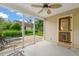Inviting back porch with ceiling fan and outdoor furniture, perfect for relaxation at 20 Timberlyne Rd, Chapel Hill, NC 27514