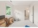 Carpeted bedroom with window and ample lighting, ideal for customization at 20 Timberlyne Rd, Chapel Hill, NC 27514