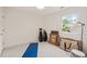 Bedroom with window and carpet currently used for storage or hobbies at 20 Timberlyne Rd, Chapel Hill, NC 27514