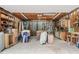 Interior of garage, well lit and organized, with tools, shelving, and worktables at 20 Timberlyne Rd, Chapel Hill, NC 27514
